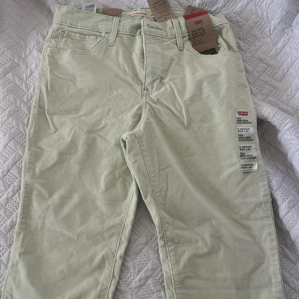 Levi's 724 High Rise Straight jeans in light green corduroy